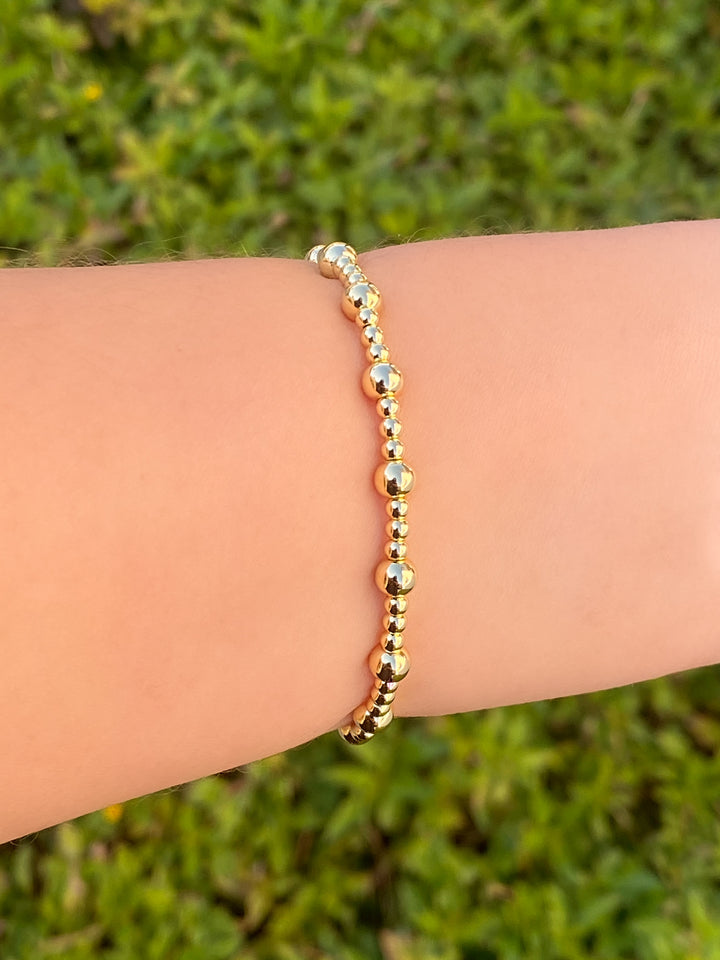 Pulsera Mini Bolitas Doradas Triples