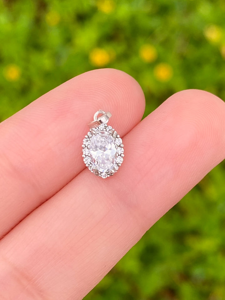 Dije Ovalado Zirconias Oro 14k