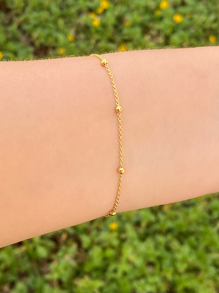 Pulseras Con Bolitas Doradas