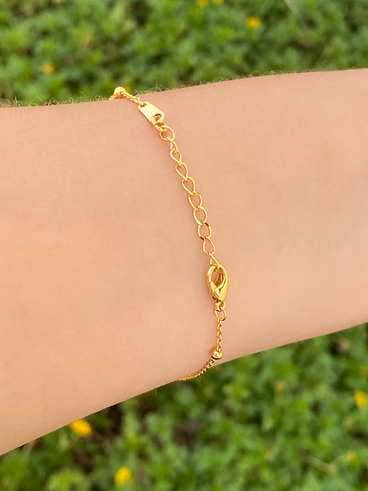 Pulsera Con Bolitas Doradas Inicial y San Benito