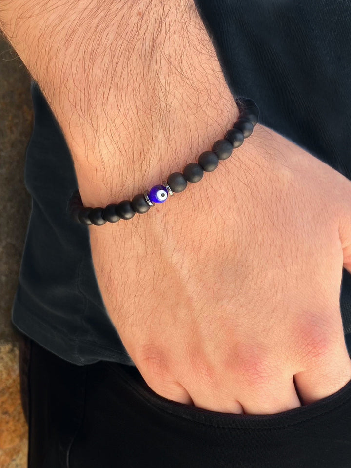 Pulsera Bolitas Negras con Ojo