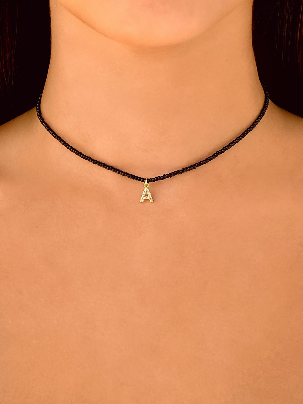 Choker Chaquiras Negras Inicial