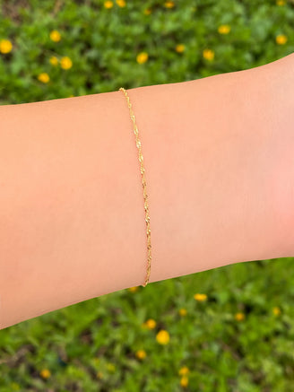 Pulsera Torcida Delgada Oro 14k