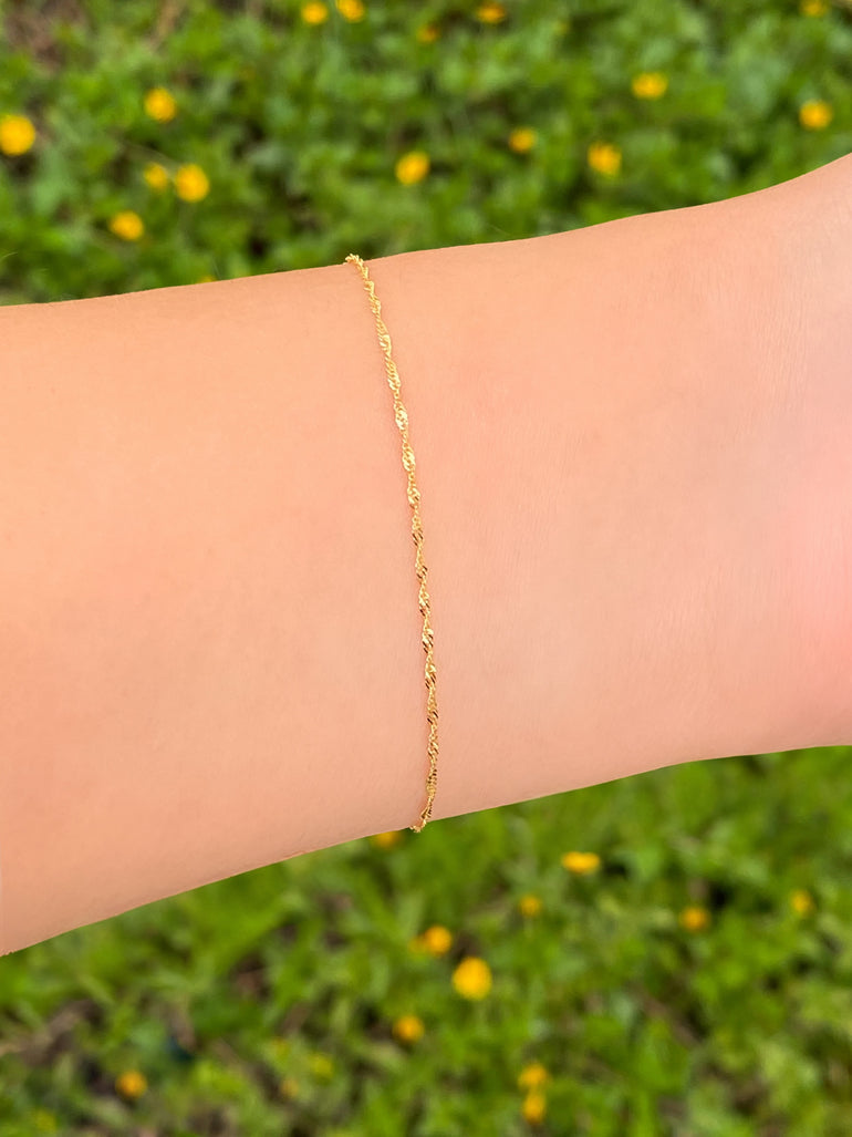 Pulsera Torcida Delgada Oro 14k