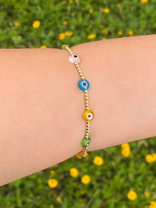 Pulsera Bolitas Doradas Con Ojos Rainbow