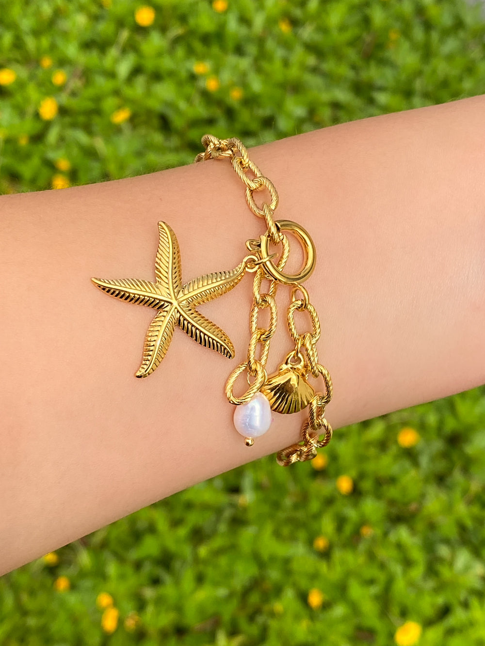 Pulsera Con Estrella De Mar Y Broche Timon