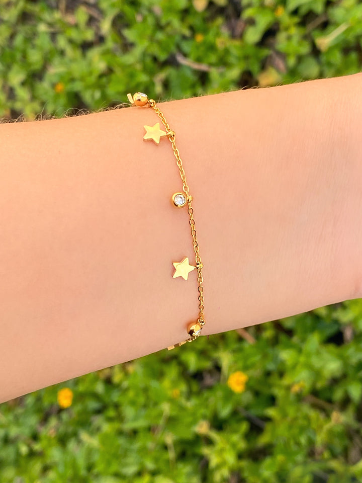 Pulsera Con Dijes Estrellas Y Zirconias