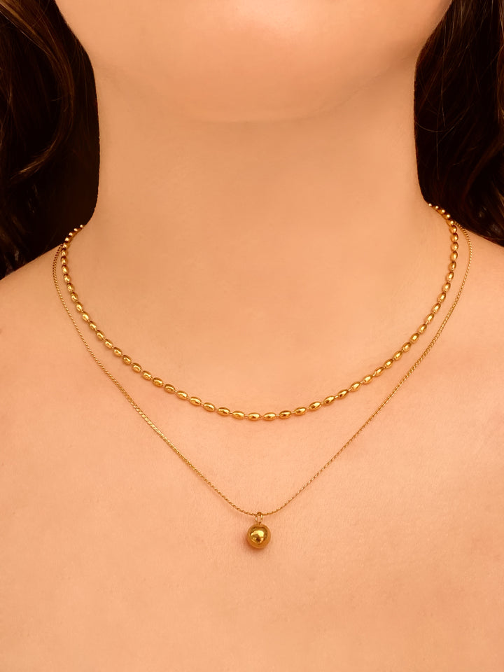 Collar Doble Con Bolita Dorada