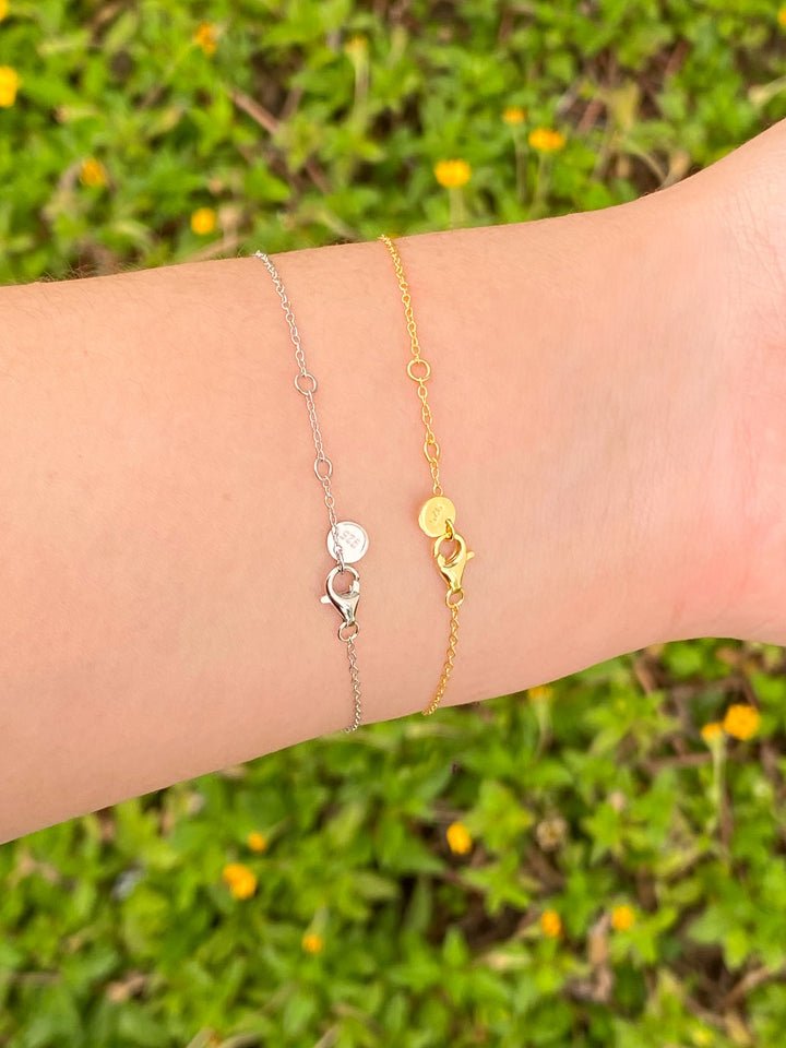 Pulsera Linea Cuatro Zirconias Redondas
