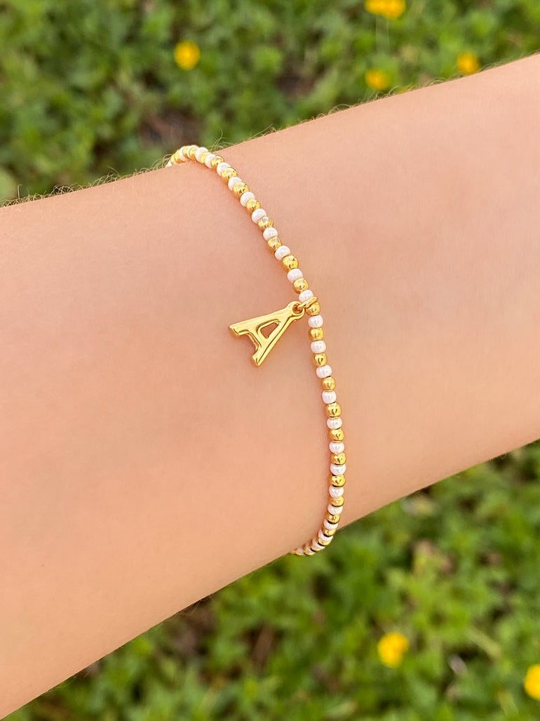 Pulsera Inicial Blanco y Dorado