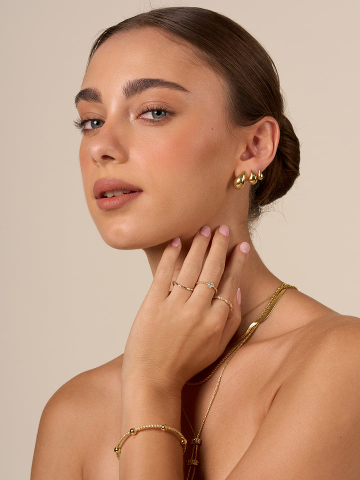 Anillo Zirconias Petalos y Redondas