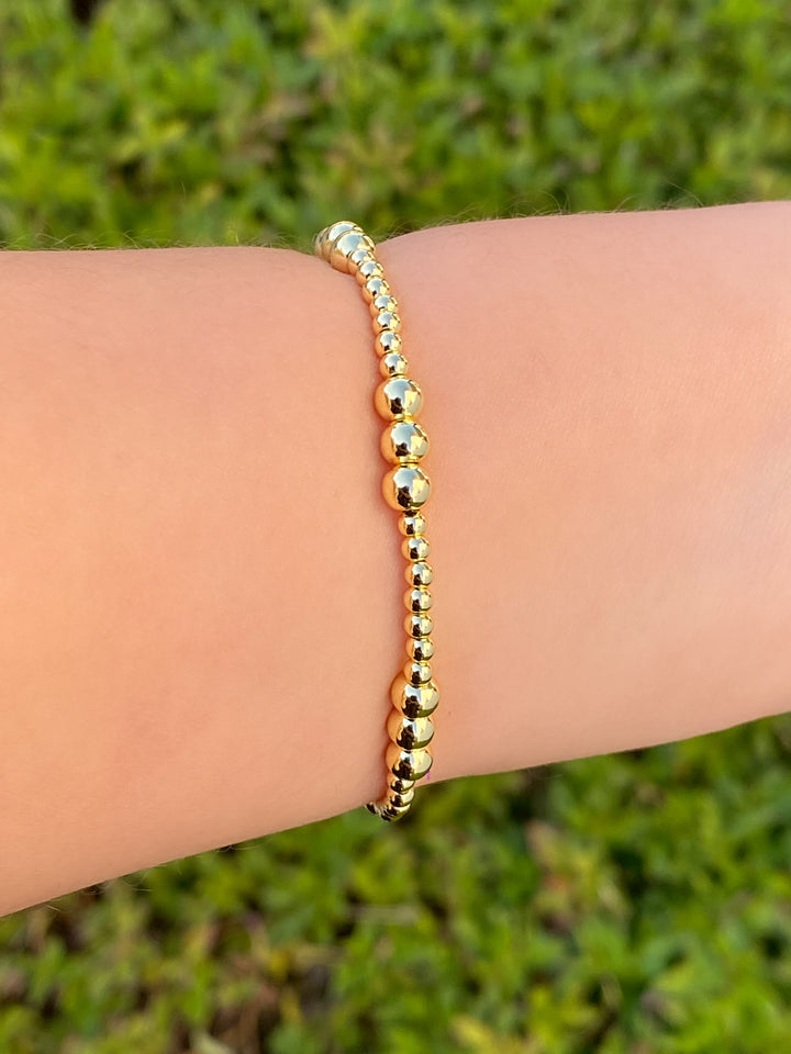 Pulsera Bolitas Doradas Triples Intercaladas
