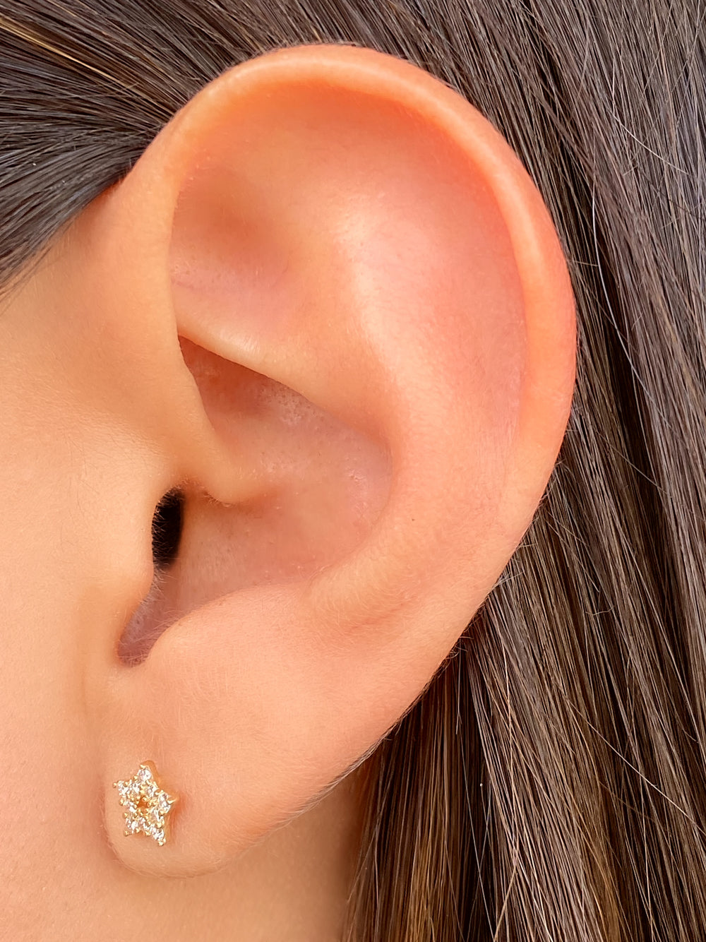 Arete Broquel Estrella Diamante 0.10 CT Oro 14k