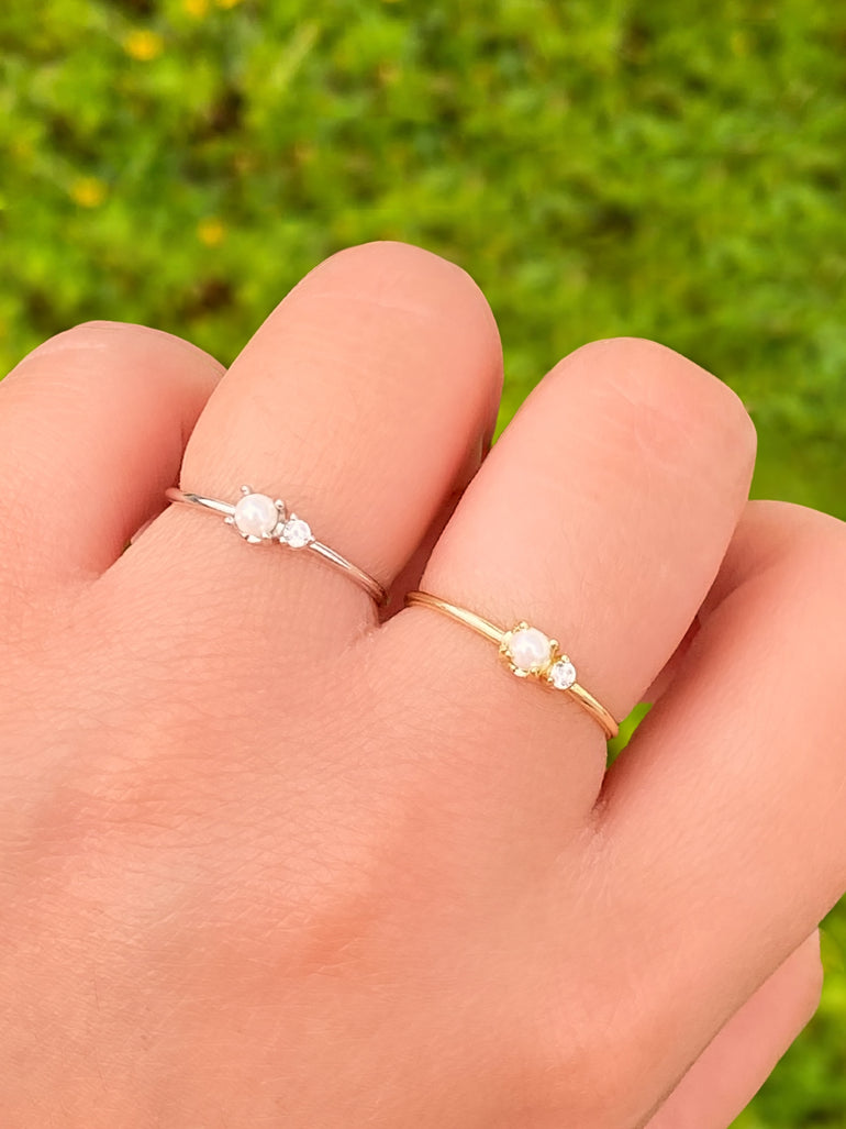 Anillo Perla y Zirconia Central