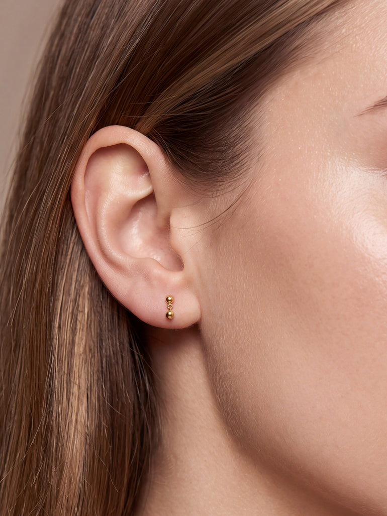 Arete Doble Bolita Primera Perforacion Titanio