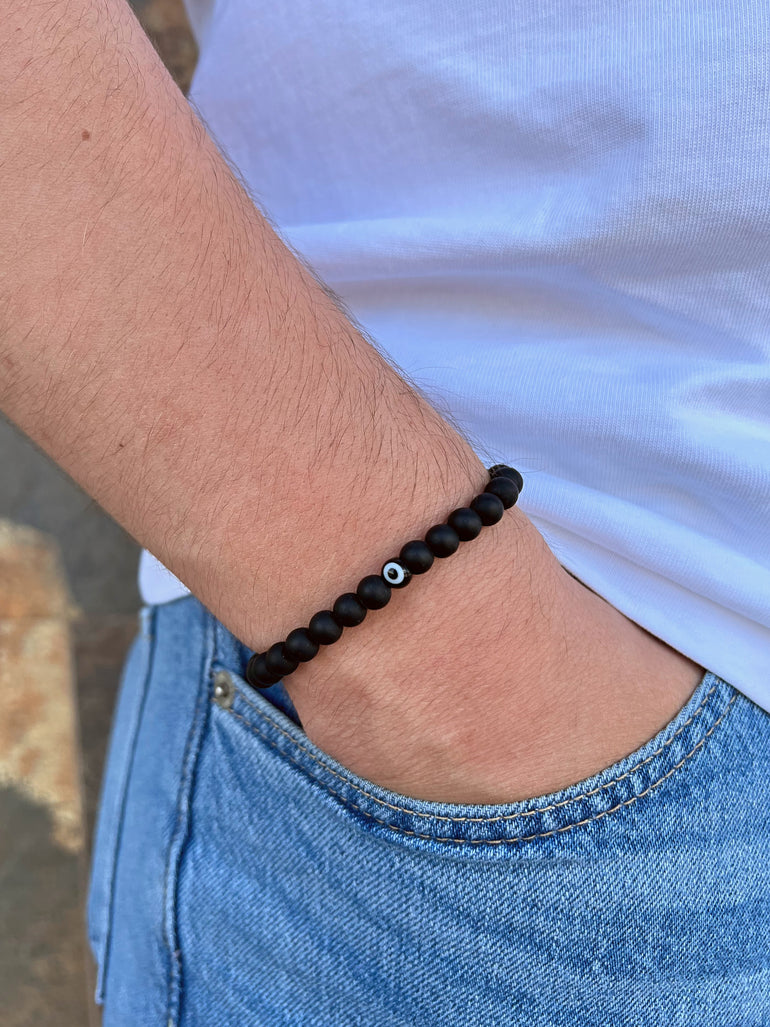 Pulsera Bolitas Negras con Ojito