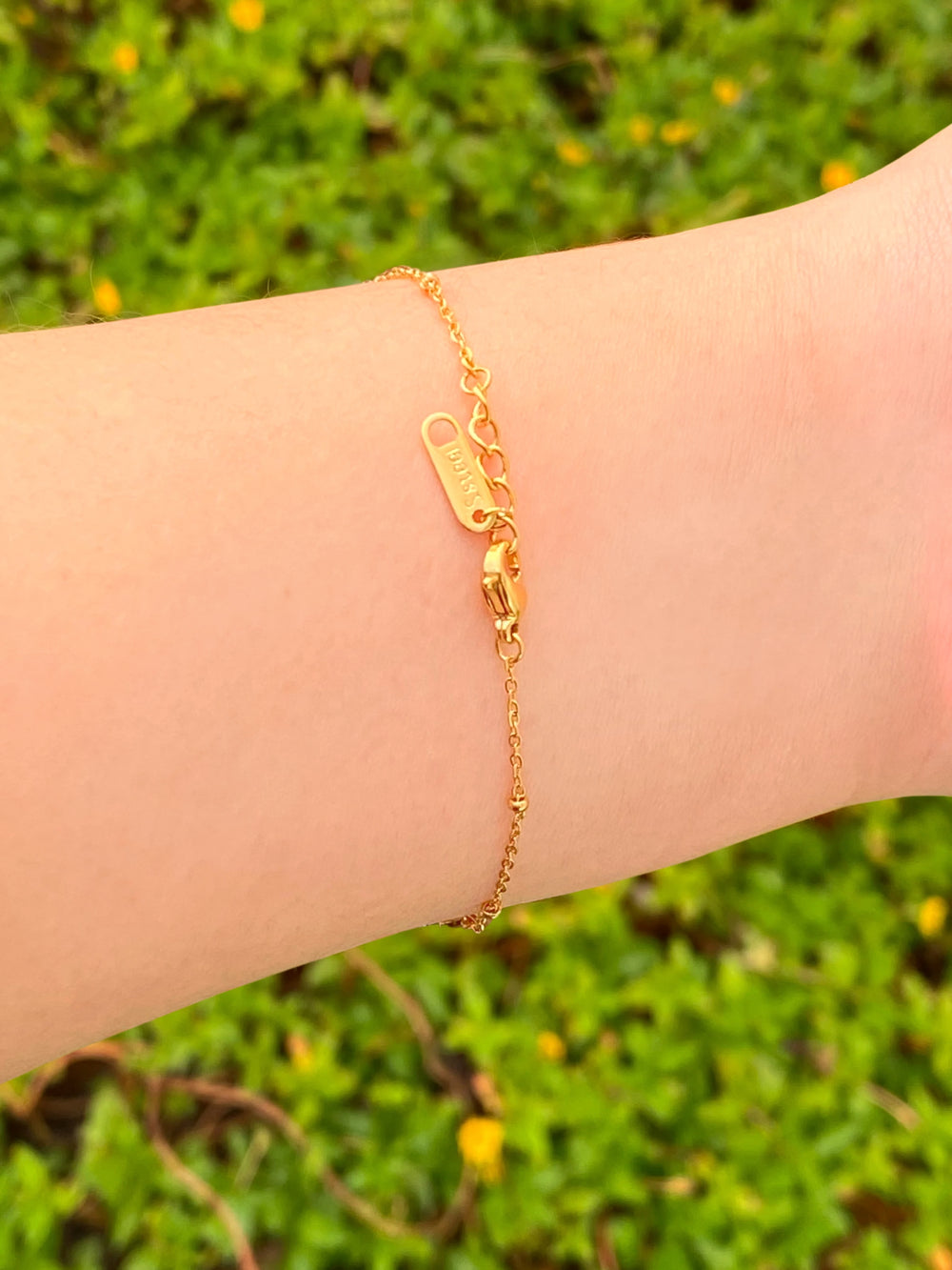 Pulsera Con Moño y Dos Corazones