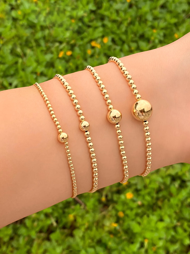 Pulsera Bolitas Chicas y Bolita Central Gold Filled