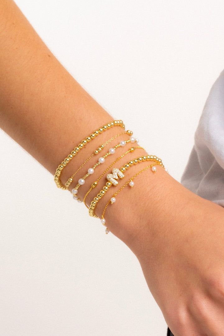 Pulsera Dorada Con Inicial Mini Bubble Zirconia