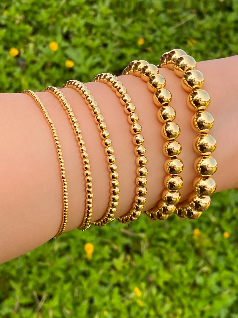 Pulsera Bolitas Doradas
