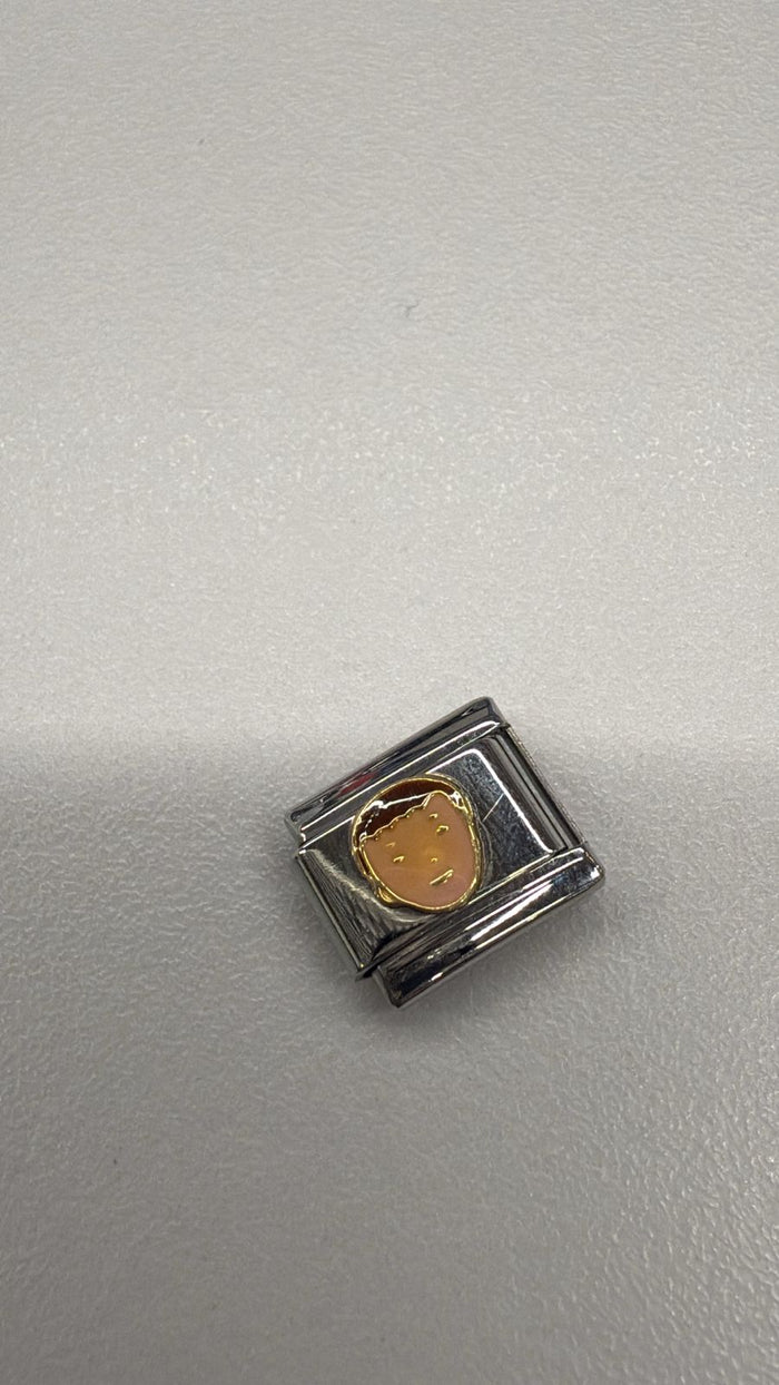 NUEVO charm niño