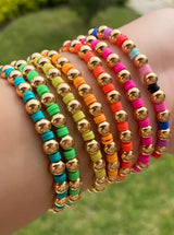Pulsera Bolitas Doradas y Pucas