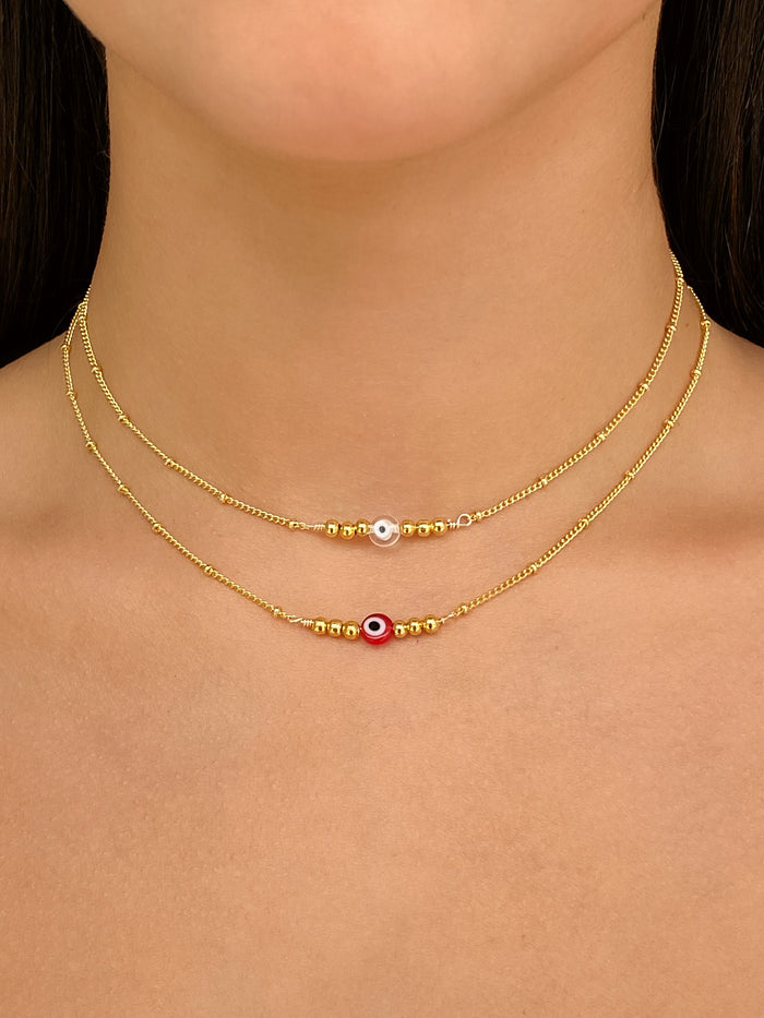 Choker Ojo Con Bolitas Doradas