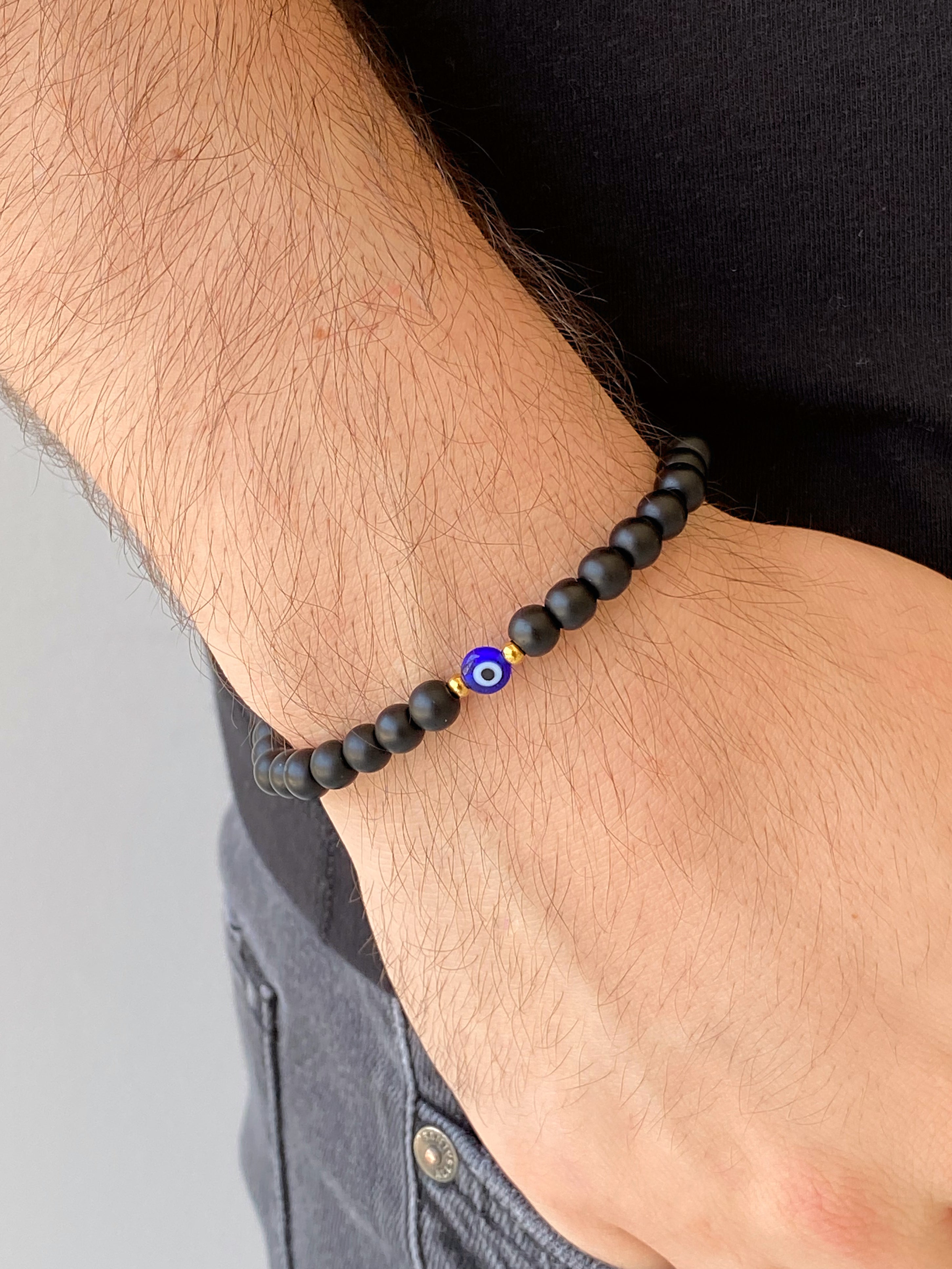 Pulsera Bolitas Negras Con Ojo Azul